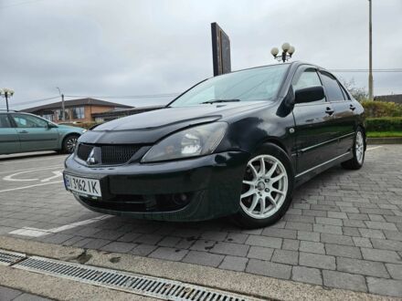 Мицубиси Лансер 2007 в Горишние Плавни (Комсомольск) на Automoto.ua Черный Мицубиси Лансер, объемом двигателя 2 л и пробегом 237 тыс. км за 4300 $, фото 1 на Automoto.ua