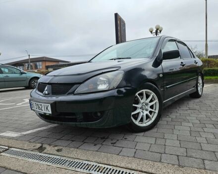 Міцубісі Lancer 2007 у Горішні Плавні (Комсомольськ) на Automoto.ua Чорний Міцубісі Lancer, об'ємом двигуна 2 л та пробігом 237 тис. км за 4300 $, фото 1 на Automoto.ua