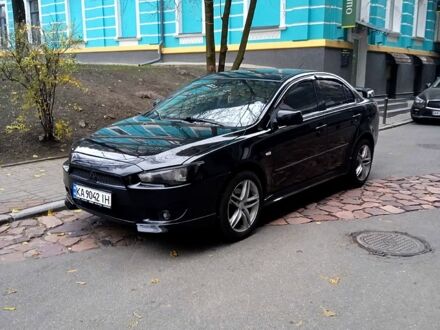 Чорний Міцубісі Lancer, об'ємом двигуна 2 л та пробігом 229 тис. км за 6300 $, фото 1 на Automoto.ua