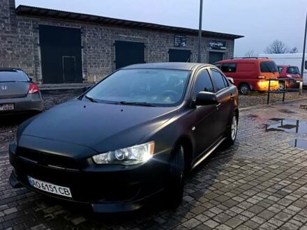 Черный Мицубиси Лансер, объемом двигателя 1.5 л и пробегом 300 тыс. км за 5500 $, фото 1 на Automoto.ua