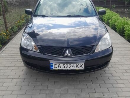 Чорний Міцубісі Lancer, об'ємом двигуна 1.6 л та пробігом 200 тис. км за 3500 $, фото 1 на Automoto.ua