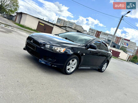 Чорний Міцубісі Lancer, об'ємом двигуна 2 л та пробігом 204 тис. км за 6990 $, фото 1 на Automoto.ua