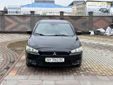 Чорний Міцубісі Lancer, об'ємом двигуна 2 л та пробігом 186 тис. км за 6800 $, фото 1 на Automoto.ua