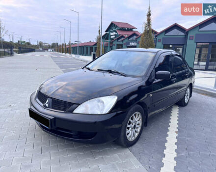 Чорний Міцубісі Lancer, об'ємом двигуна 1.6 л та пробігом 340 тис. км за 4650 $, фото 1 на Automoto.ua