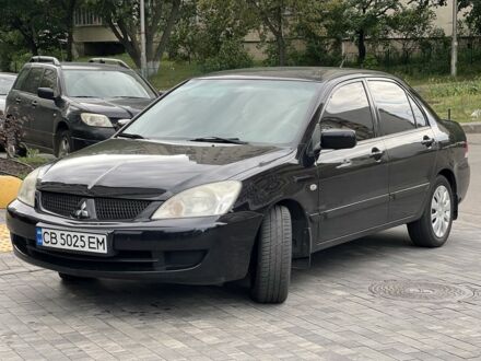 Мицубиси Лансер 2008 в Софіївська Борщагівка на Automoto.ua Черный Мицубиси Лансер, объемом двигателя 1.6 л и пробегом 163 тыс. км за 5200 $, фото 1 на Automoto.ua