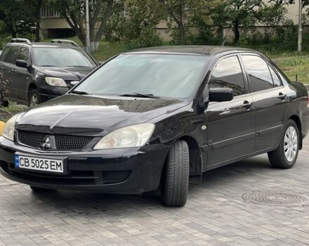 Чорний Міцубісі Lancer, об'ємом двигуна 1.6 л та пробігом 163 тис. км за 5200 $, фото 1 на Automoto.ua