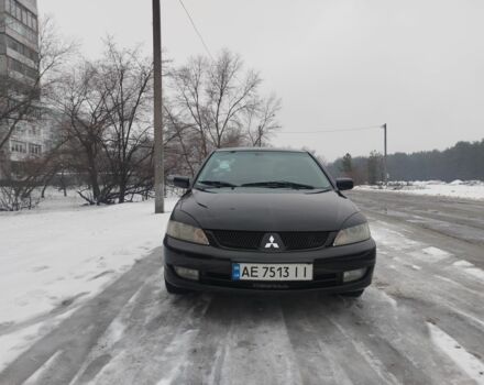 Черный Мицубиси Лансер, объемом двигателя 1.6 л и пробегом 260 тыс. км за 5500 $, фото 1 на Automoto.ua