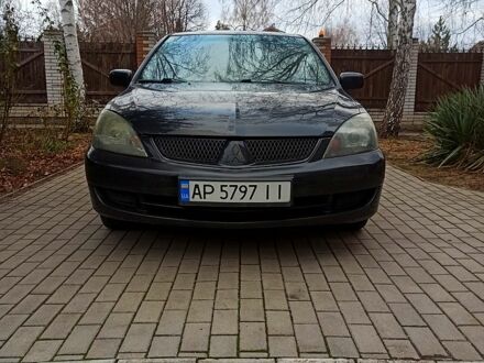 Мицубиси Лансер 2008 в Запорожье на Automoto.ua Черный Мицубиси Лансер, объемом двигателя 1.6 л и пробегом 230 тыс. км за 4470 $, фото 1 на Automoto.ua