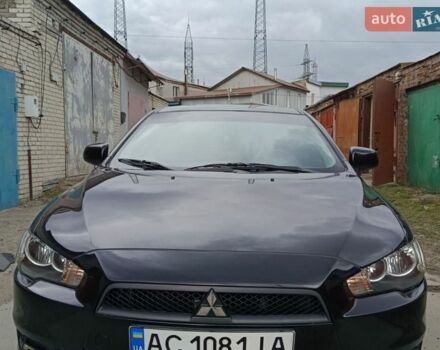 Черный Мицубиси Лансер, объемом двигателя 1.5 л и пробегом 186 тыс. км за 6900 $, фото 1 на Automoto.ua