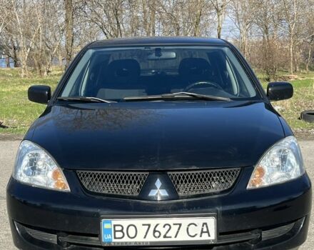 Чорний Міцубісі Lancer, об'ємом двигуна 1.6 л та пробігом 230 тис. км за 4600 $, фото 1 на Automoto.ua