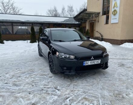 Черный Мицубиси Лансер, объемом двигателя 2 л и пробегом 257 тыс. км за 5200 $, фото 1 на Automoto.ua