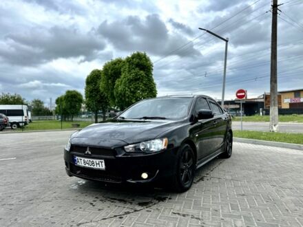 Чорний Міцубісі Lancer, об'ємом двигуна 2 л та пробігом 149 тис. км за 7500 $, фото 1 на Automoto.ua