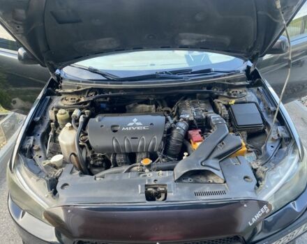 Чорний Міцубісі Lancer, об'ємом двигуна 2 л та пробігом 270 тис. км за 6428 $, фото 1 на Automoto.ua