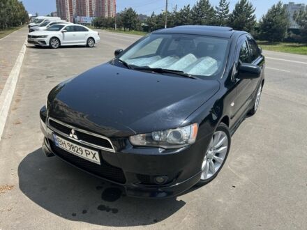 Мицубиси Лансер 2008 в Черноморске (Ильичевске) на Automoto.ua Черный Мицубиси Лансер, объемом двигателя 2 л и пробегом 166 тыс. км за 9000 $, фото 1 на Automoto.ua
