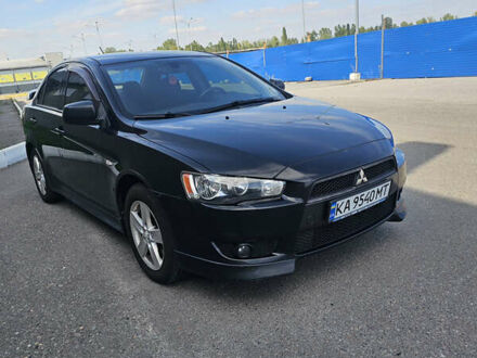 Чорний Міцубісі Lancer, об'ємом двигуна 2 л та пробігом 249 тис. км за 6500 $, фото 1 на Automoto.ua