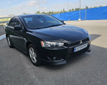 Чорний Міцубісі Lancer, об'ємом двигуна 2 л та пробігом 249 тис. км за 6500 $, фото 1 на Automoto.ua