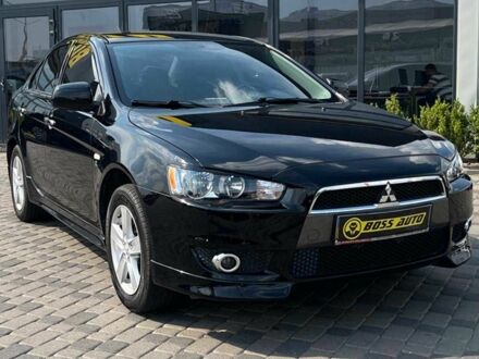 Черный Мицубиси Лансер, объемом двигателя 2 л и пробегом 54 тыс. км за 8990 $, фото 1 на Automoto.ua