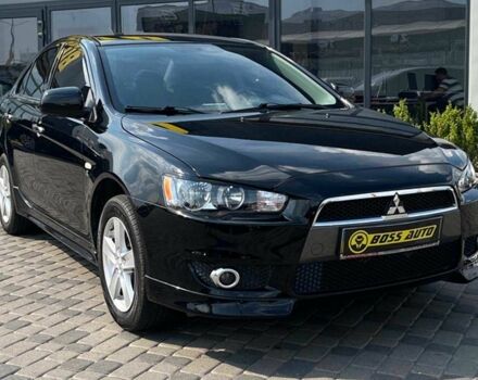 Черный Мицубиси Лансер, объемом двигателя 2 л и пробегом 54 тыс. км за 8990 $, фото 1 на Automoto.ua