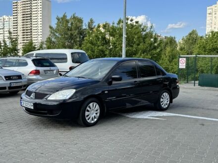 Міцубісі Lancer 2008 у Києві на Automoto.ua Чорний Міцубісі Lancer, об'ємом двигуна 1.6 л та пробігом 162 тис. км за 5000 $, фото 1 на Automoto.ua