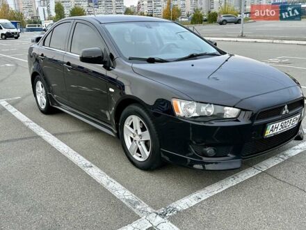 Міцубісі Lancer 2008 у Києві на Automoto.ua Чорний Міцубісі Lancer, об'ємом двигуна 2 л та пробігом 199 тис. км за 7900 $, фото 1 на Automoto.ua