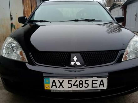 Мицубиси Лансер 2008 в Харькове на Automoto.ua Черный Мицубиси Лансер, объемом двигателя 1.58 л и пробегом 207 тыс. км за 6000 $, фото 1 на Automoto.ua