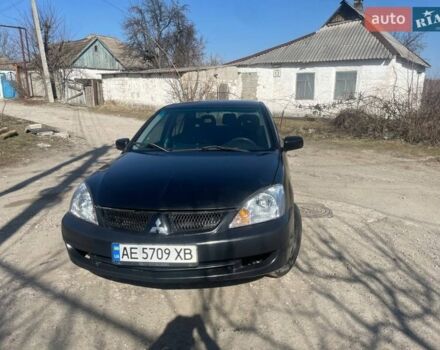 Черный Мицубиси Лансер, объемом двигателя 1.6 л и пробегом 311 тыс. км за 3150 $, фото 1 на Automoto.ua