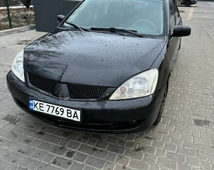 Черный Мицубиси Лансер, объемом двигателя 1.6 л и пробегом 278 тыс. км за 3900 $, фото 1 на Automoto.ua