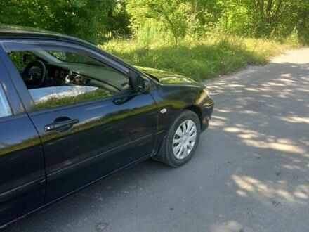 Мицубиси Лансер 2008 в Житомире на Automoto.ua Черный Мицубиси Лансер, объемом двигателя 1.6 л и пробегом 320 тыс. км за 3800 $, фото 1 на Automoto.ua