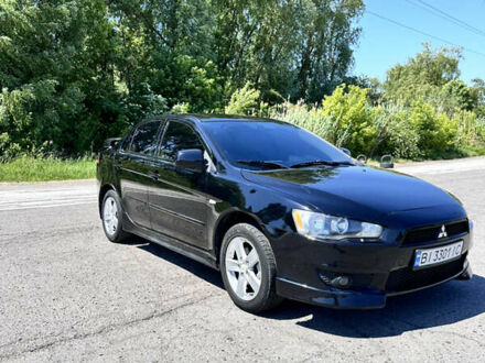 Чорний Міцубісі Lancer, об'ємом двигуна 1.47 л та пробігом 206 тис. км за 7000 $, фото 1 на Automoto.ua