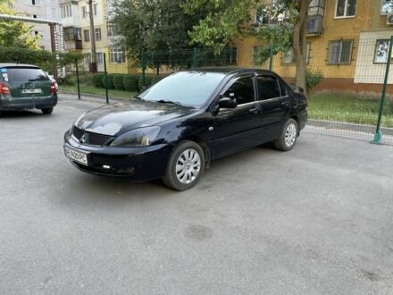 Мицубиси Лансер 2008 в Днепре (Днепропетровске) на Automoto.ua Черный Мицубиси Лансер, объемом двигателя 1.6 л и пробегом 196 тыс. км за 4000 $, фото 1 на Automoto.ua