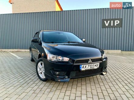 Міцубісі Lancer 2008 у Харкові на Automoto.ua Чорний Міцубісі Lancer, об'ємом двигуна 2 л та пробігом 145 тис. км за 7800 $, фото 1 на Automoto.ua