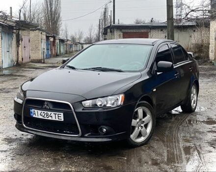 Черный Мицубиси Лансер, объемом двигателя 1.5 л и пробегом 236 тыс. км за 5400 $, фото 1 на Automoto.ua