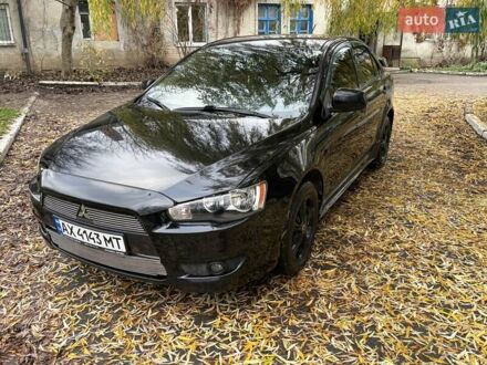Чорний Міцубісі Lancer, об'ємом двигуна 2 л та пробігом 260 тис. км за 6100 $, фото 1 на Automoto.ua