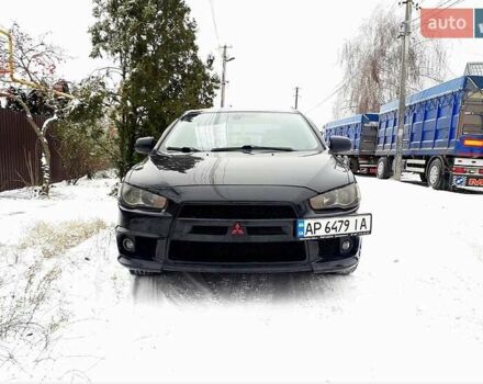 Черный Мицубиси Лансер, объемом двигателя 2 л и пробегом 208 тыс. км за 9500 $, фото 1 на Automoto.ua