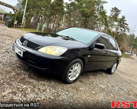 Чорний Міцубісі Lancer, об'ємом двигуна 1.6 л та пробігом 216 тис. км за 5190 $, фото 1 на Automoto.ua