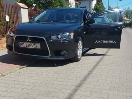 Чорний Міцубісі Lancer, об'ємом двигуна 2 л та пробігом 257 тис. км за 5500 $, фото 1 на Automoto.ua