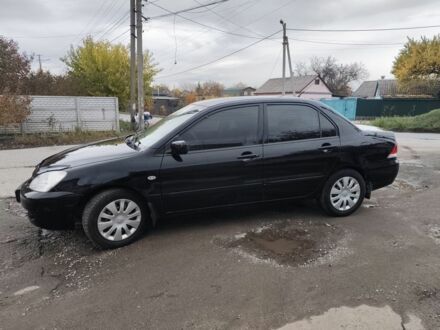 Мицубиси Лансер 2008 в Днепре (Днепропетровске) на Automoto.ua Черный Мицубиси Лансер, объемом двигателя 1.6 л и пробегом 270 тыс. км за 3800 $, фото 1 на Automoto.ua
