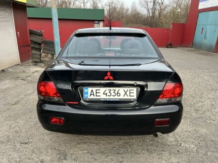 Міцубісі Lancer 2008 у Кривому Розі на Automoto.ua Чорний Міцубісі Lancer, об'ємом двигуна 1.6 л та пробігом 148 тис. км за 4400 $, фото 1 на Automoto.ua