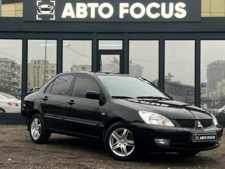 Черный Мицубиси Лансер, объемом двигателя 0 л и пробегом 340 тыс. км за 6190 $, фото 1 на Automoto.ua