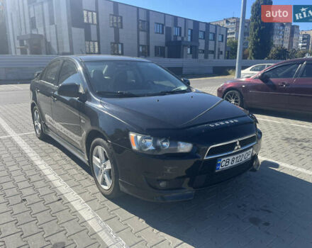 Чорний Міцубісі Lancer, об'ємом двигуна 2 л та пробігом 237 тис. км за 5800 $, фото 1 на Automoto.ua