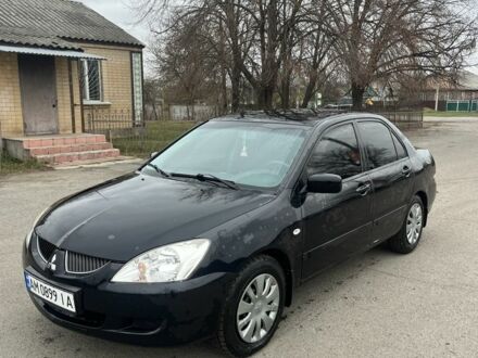 Чорний Міцубісі Lancer, об'ємом двигуна 1.6 л та пробігом 1 тис. км за 3750 $, фото 1 на Automoto.ua