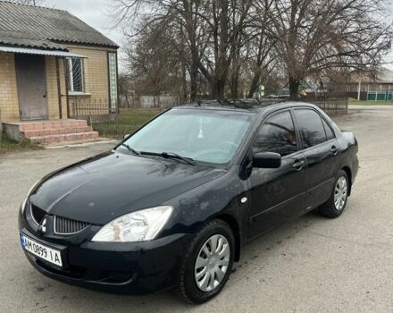 Чорний Міцубісі Lancer, об'ємом двигуна 1.6 л та пробігом 1 тис. км за 3750 $, фото 1 на Automoto.ua