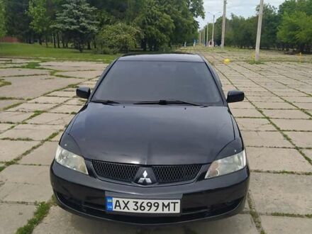Мицубиси Лансер 2008 в Харькове на Automoto.ua Черный Мицубиси Лансер, объемом двигателя 1.6 л и пробегом 241 тыс. км за 4000 $, фото 1 на Automoto.ua