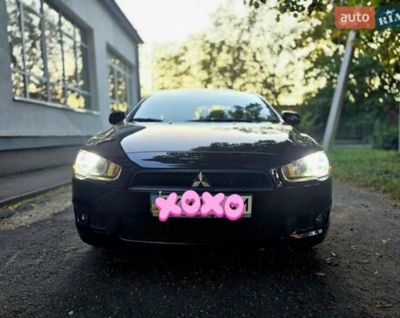 Чорний Міцубісі Lancer, об'ємом двигуна 1.5 л та пробігом 132 тис. км за 7999 $, фото 1 на Automoto.ua