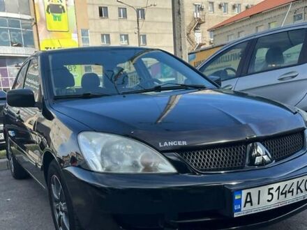 Мицубиси Лансер 2008 в Запорожье на Automoto.ua Черный Мицубиси Лансер, объемом двигателя 1.6 л и пробегом 315 тыс. км за 4500 $, фото 1 на Automoto.ua