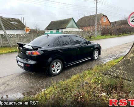 Чорний Міцубісі Lancer, об'ємом двигуна 2 л та пробігом 226 тис. км за 6600 $, фото 1 на Automoto.ua