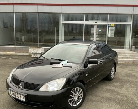 Черный Мицубиси Лансер, объемом двигателя 1.6 л и пробегом 350 тыс. км за 4500 $, фото 1 на Automoto.ua