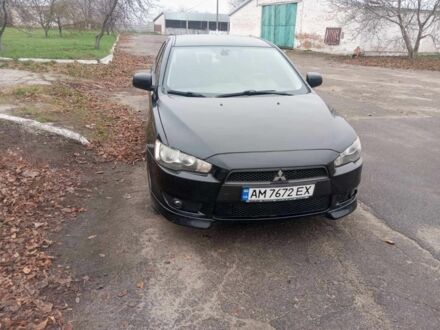 Черный Мицубиси Лансер, объемом двигателя 2 л и пробегом 232 тыс. км за 5000 $, фото 1 на Automoto.ua