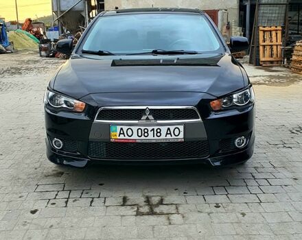 Чорний Міцубісі Lancer, об'ємом двигуна 2 л та пробігом 55 тис. км за 8700 $, фото 1 на Automoto.ua