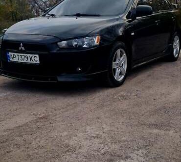 Черный Мицубиси Лансер, объемом двигателя 2 л и пробегом 211 тыс. км за 6900 $, фото 1 на Automoto.ua